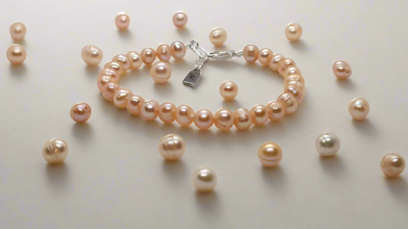 Peach Pearl Bracelet - silver lobster clasp extended
